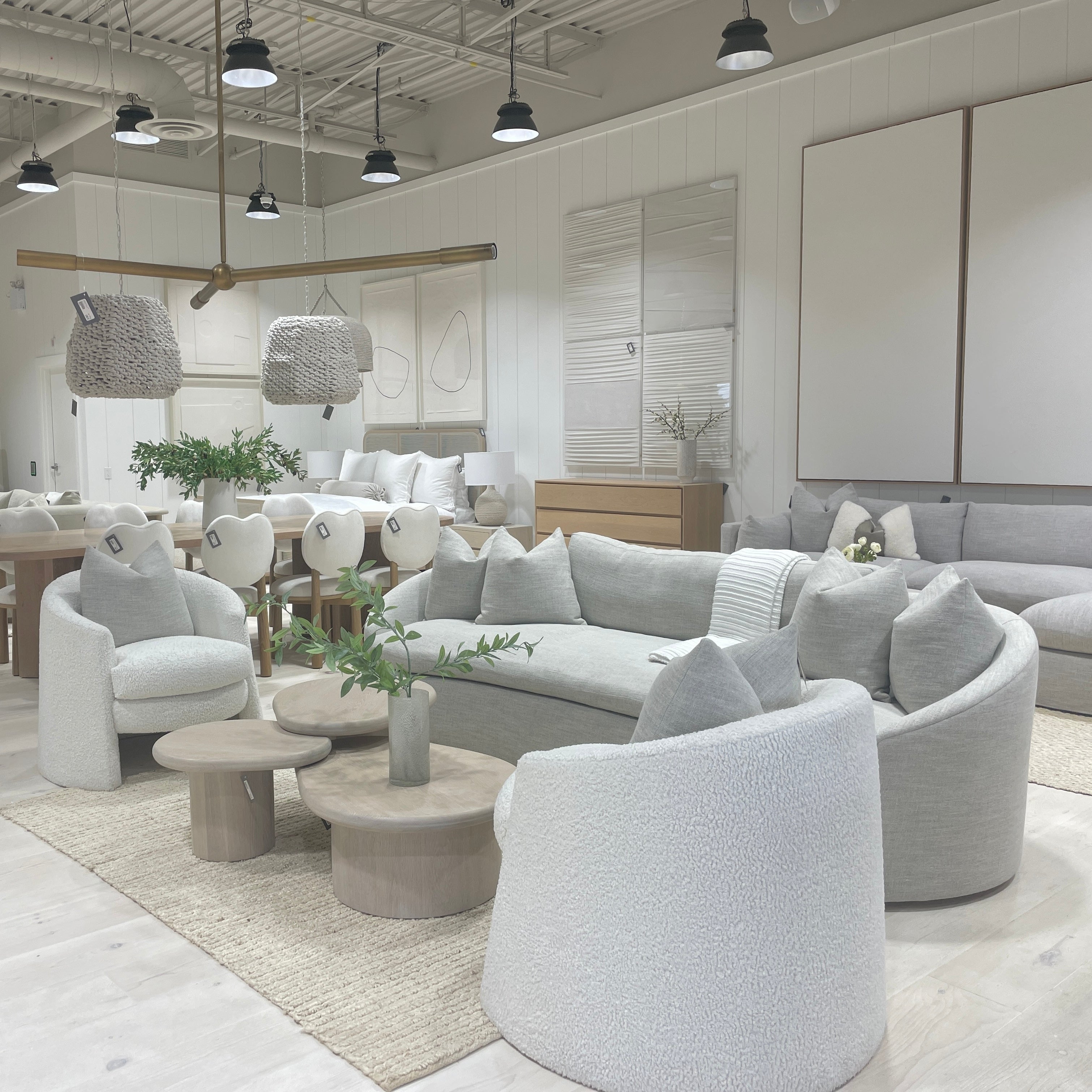 As Shown: in upholstered Zion Custard, oak legs finished in Mint White Natural.