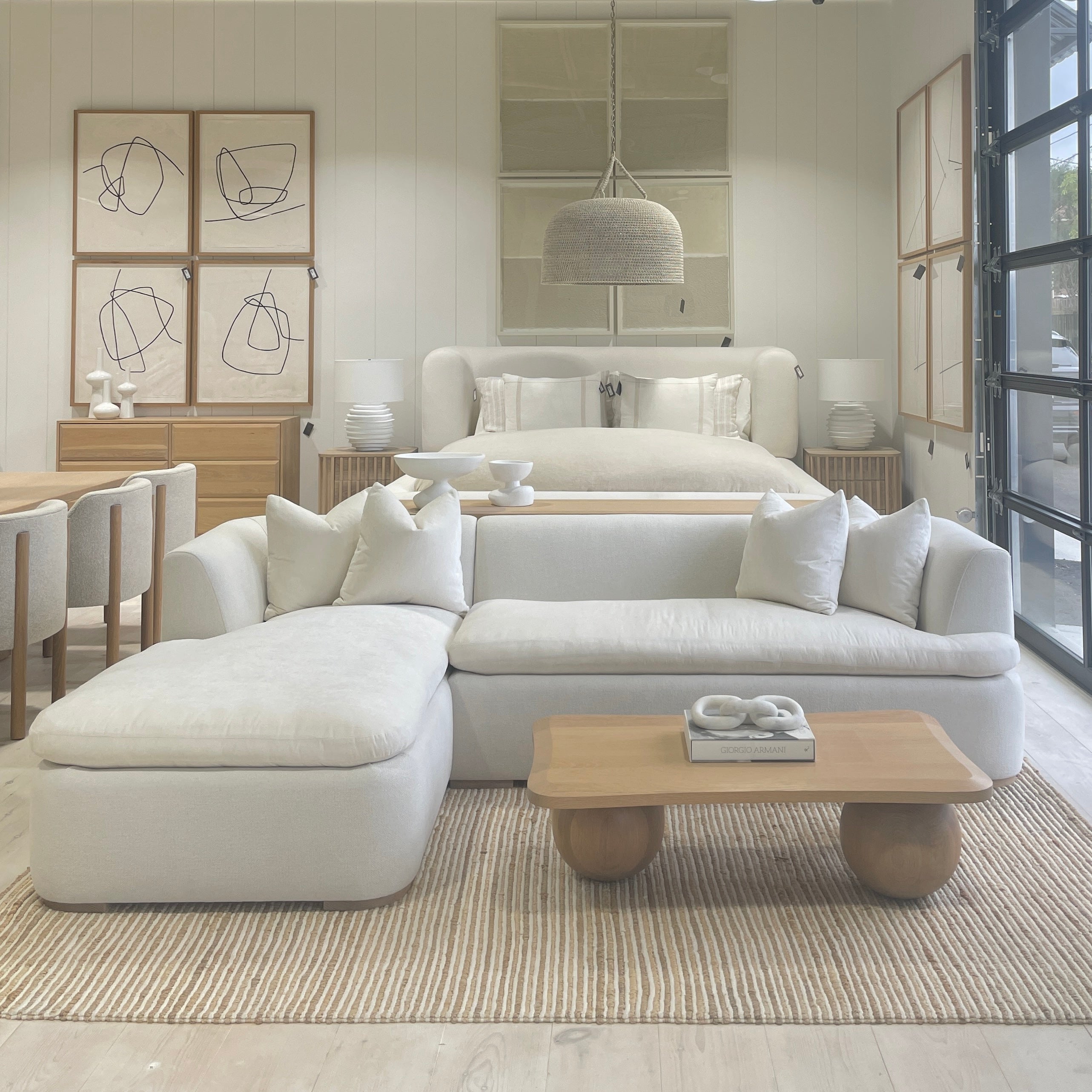 As Shown: Upholstered in COM with Lincoln Parchment seat cushions and pillows. Last variant  in Belgian Sky Blue.Oak legs finished in Mint White Natural.