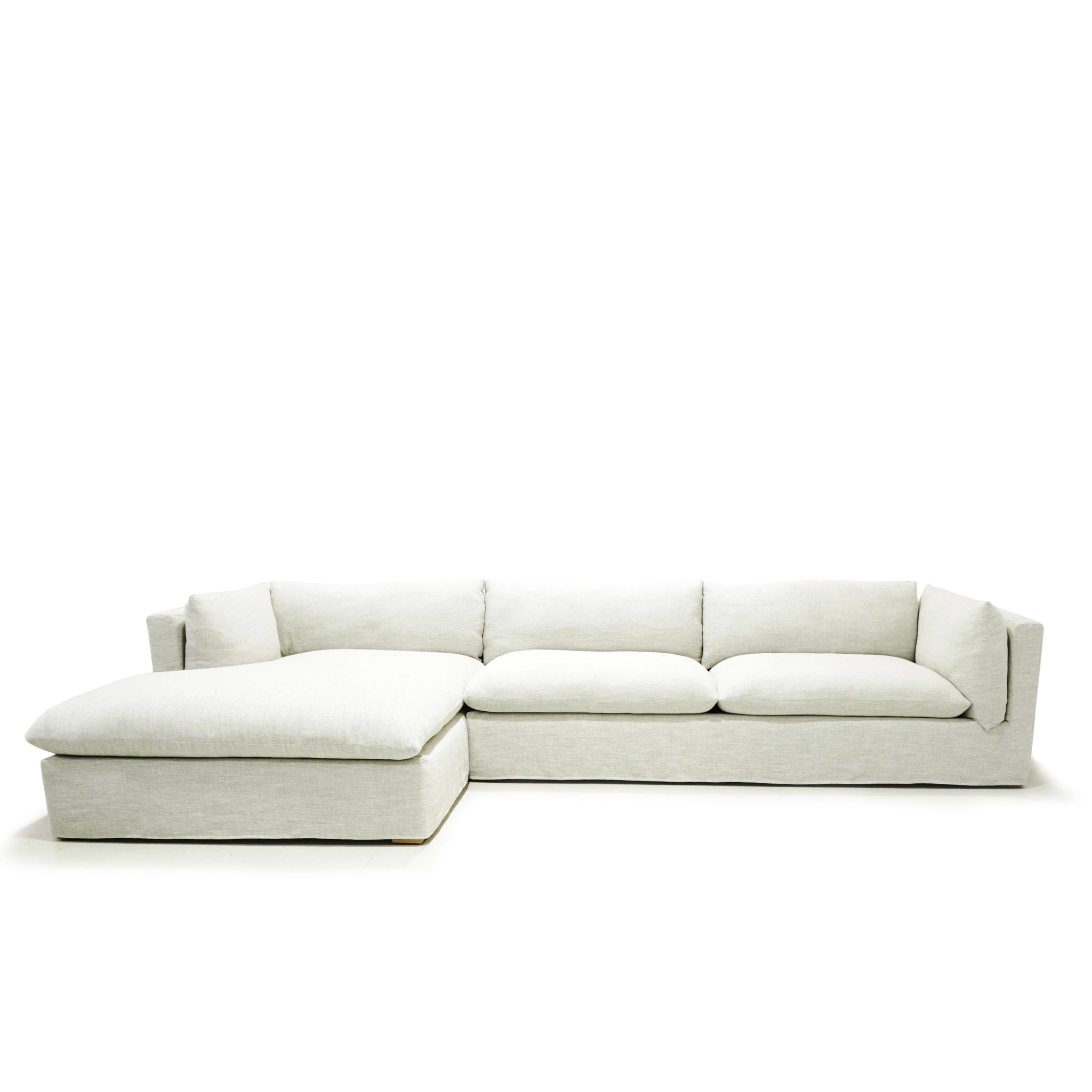 Shown in right chaise slipcovered Belgian Mulberry