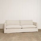 As Shown: Slipcovered in Frame Natural with a 2 over 2 Cushion Configuration