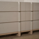 As Shown: Variant 1: (Body) Ash wire brushed in Revere Pewter, (Base) Oak stained in Mint White Natural